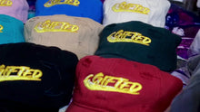 Load and play video in Gallery viewer, GOLD GIFTED LOGO Hats (Flavors for Days Hat Collection)
